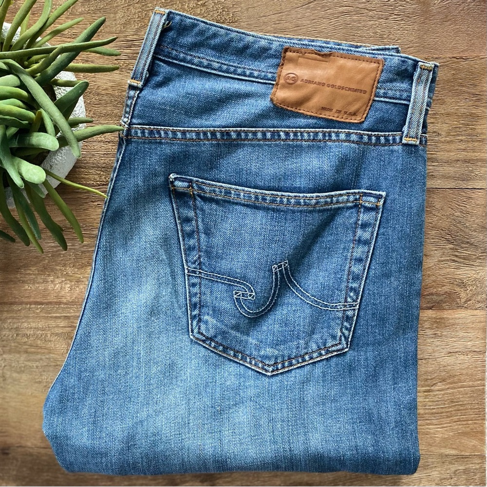 AG Adriano Goldschmmied Men’s Straight Blue Jeans with Tan Leather Patch